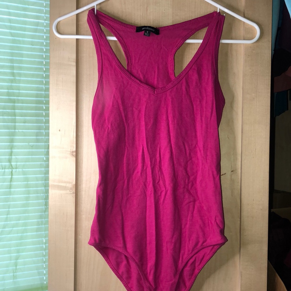 Small pink body suit